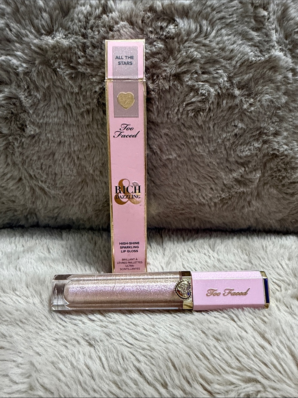 Too Faced Rich & Dazzling High-Shine Sparkling Lip Gloss in Light Pink Shimmer
